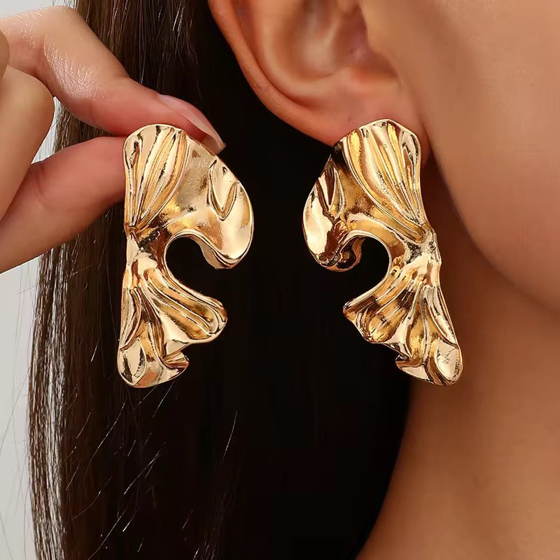 Assymetric leaf earrings