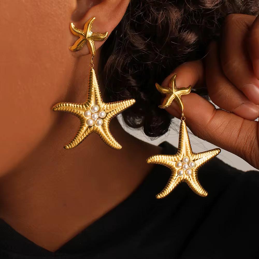 Gold starfish dangle Earrings with pearl detailing for women